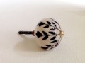 Black Leaf Design on Cream Porcelain Cabinet Knobs Pulls 1.jpeg